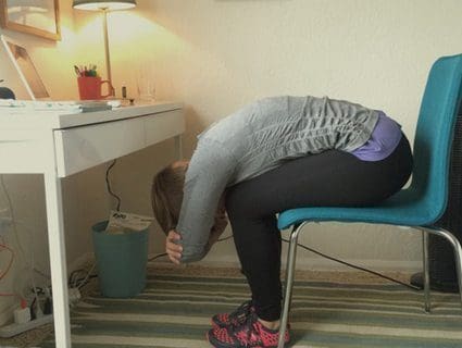 Girl Stretching for Lower Back Pain