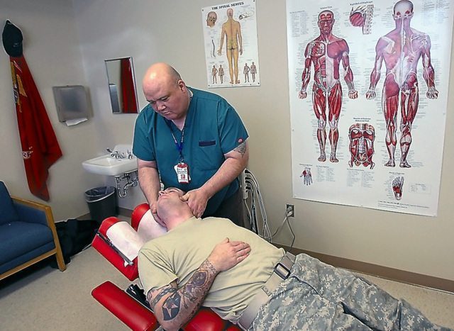 blog picture of veteran receiving chiropractic treatment