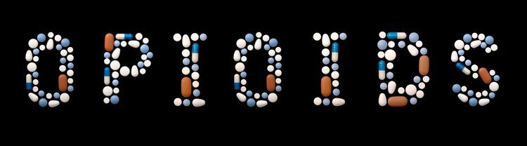 blog picture of pills spelling out the word opioids