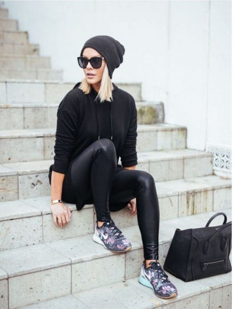 lady sitting on steps with tennis shoes