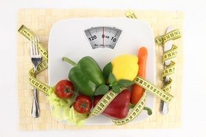 blog picture of weight scale, tape measure and vegetables