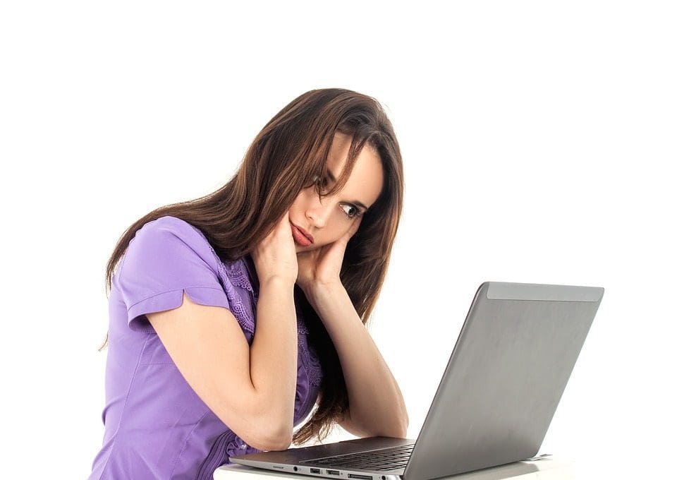 girl on laptop headache
