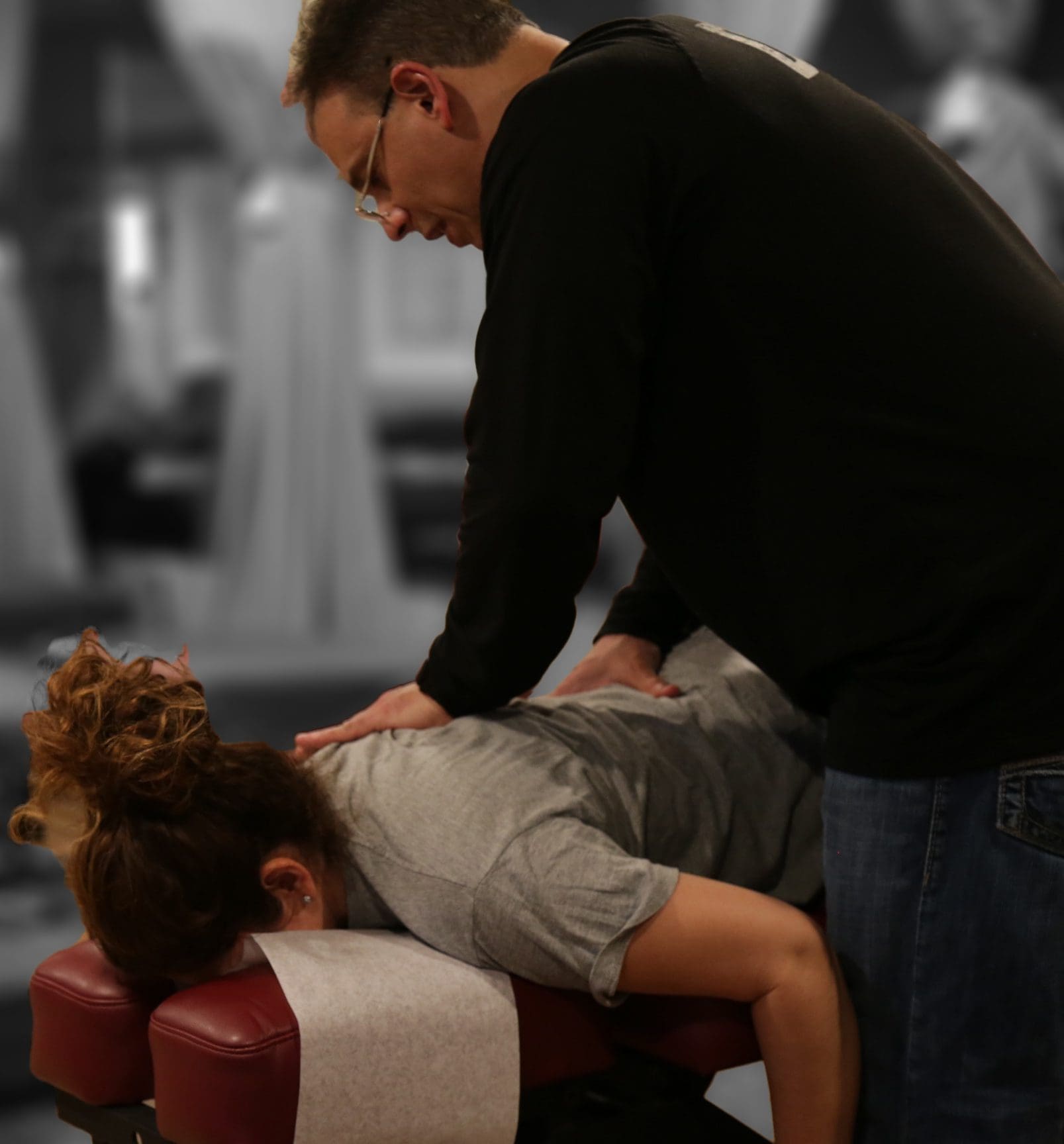 Dr. Jimenez works on patient's back
