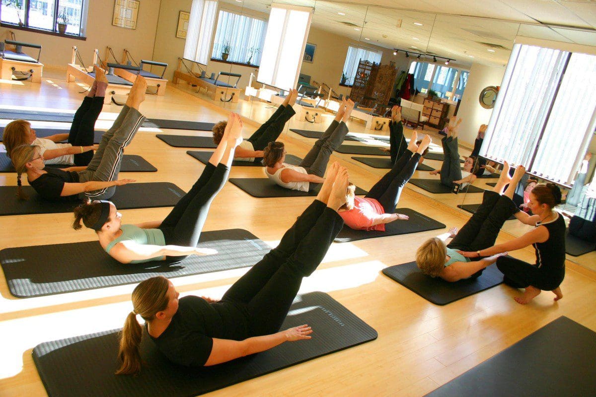 Image demonstrating a Pilates class with an Instructor | El Paso, TX Chiropractor