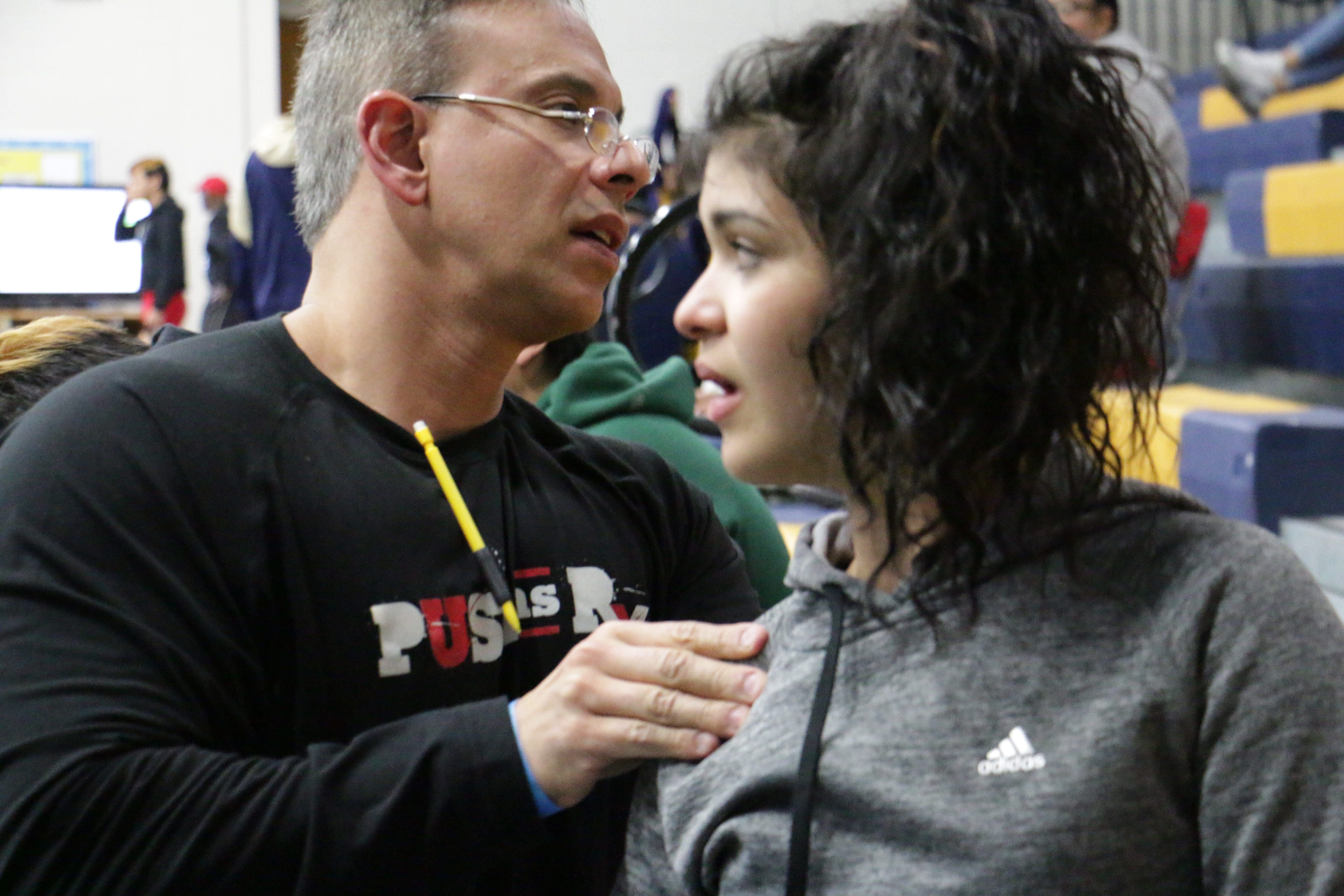 Dr. Jimenez performing physical therapy on a patient.